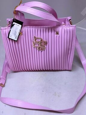 NWT BEBE pink medium size bag never used